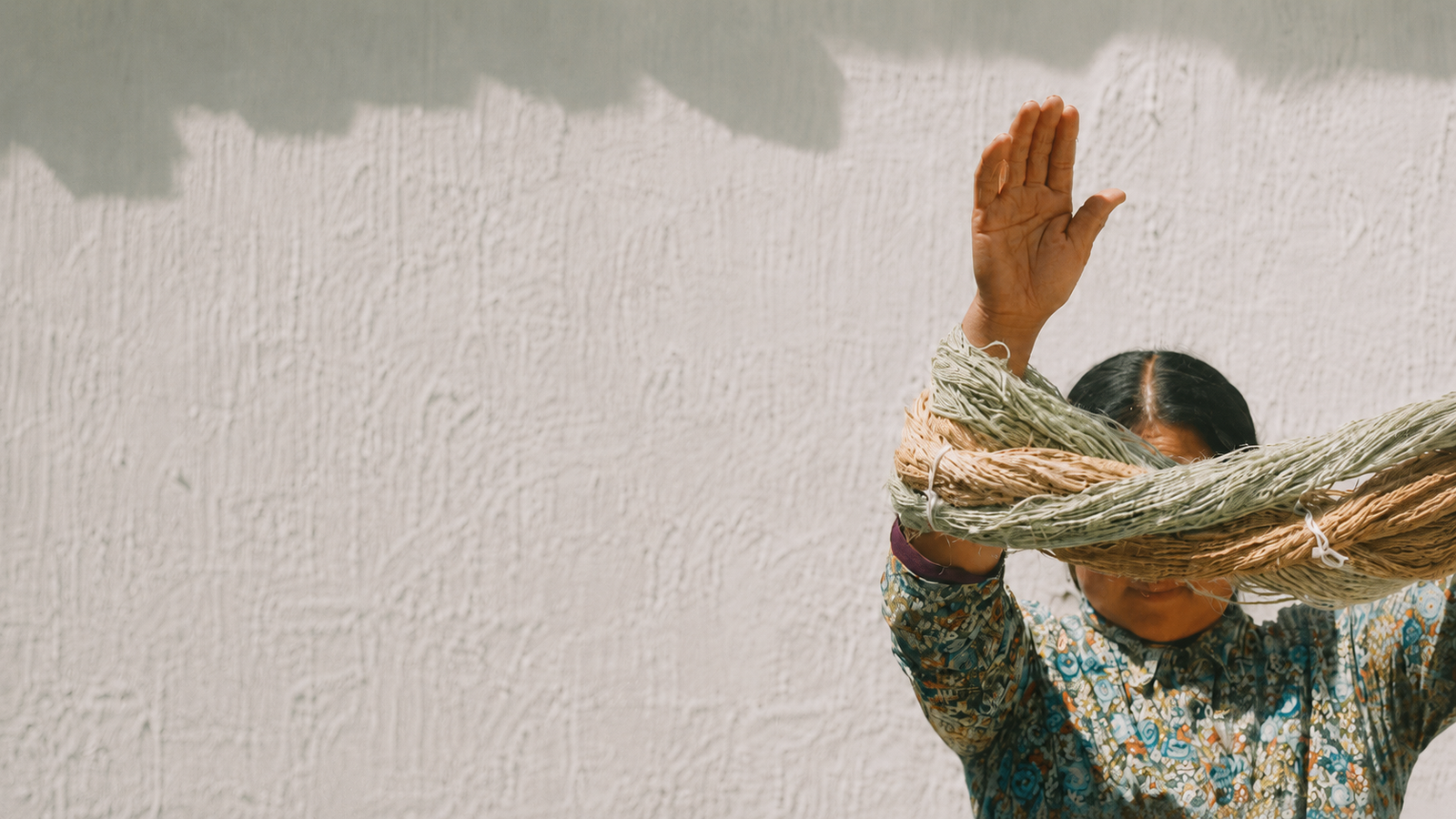 Artisan hands working on loom